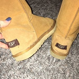 Brown tall uggs
